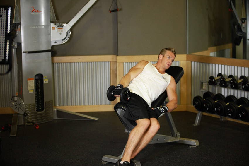 One-Arm Incline Lateral Raise, position 1 of 2