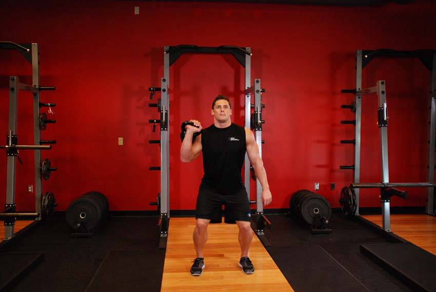 One-Arm Kettlebell Jerk, position 2 of 2
