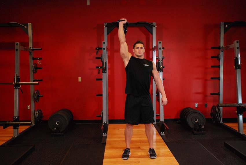One-Arm Kettlebell Para Press, position 2 of 2