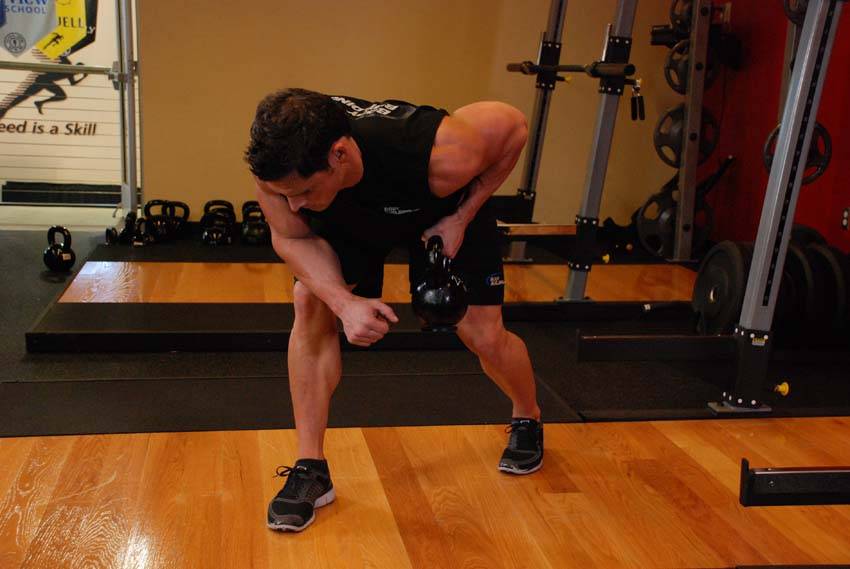 One-Arm Kettlebell Row, position 2 of 2
