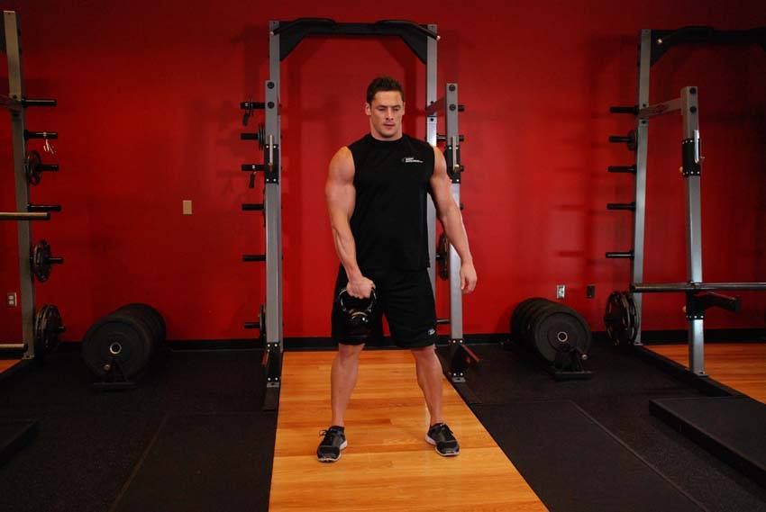 One-Arm Kettlebell Snatch, position 1 of 2