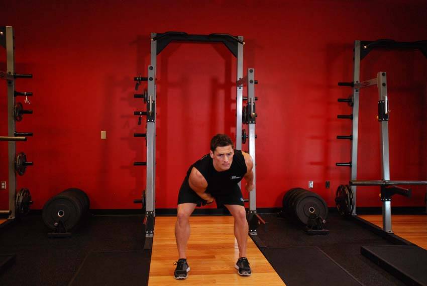 One-Arm Kettlebell Snatch, position 2 of 2