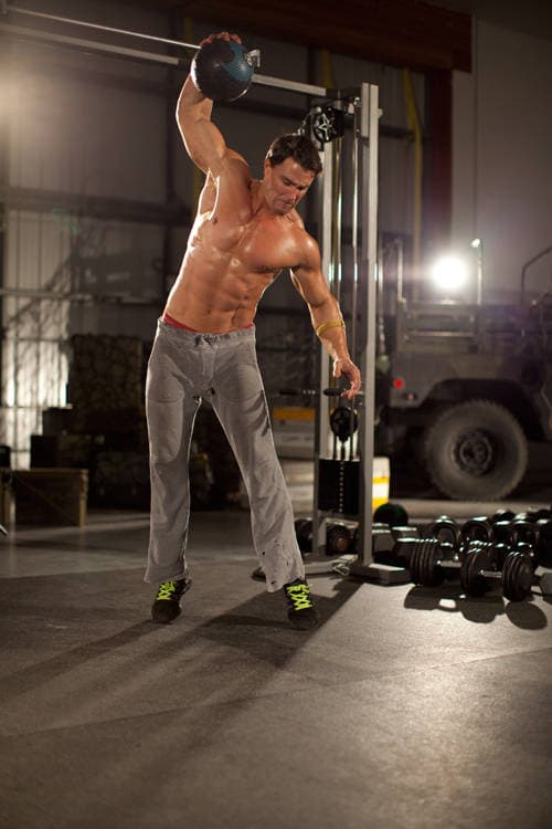 One-Arm Medicine Ball Slam, position 1 of 2