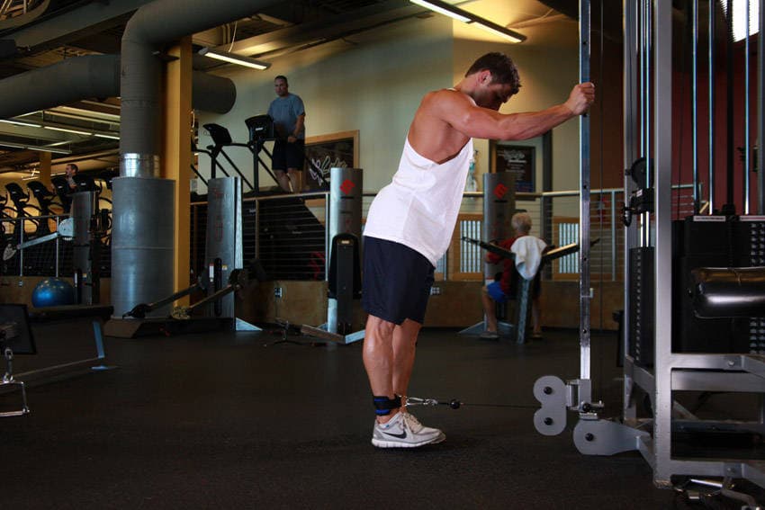 One-Legged Cable Kickback, position 1 of 2