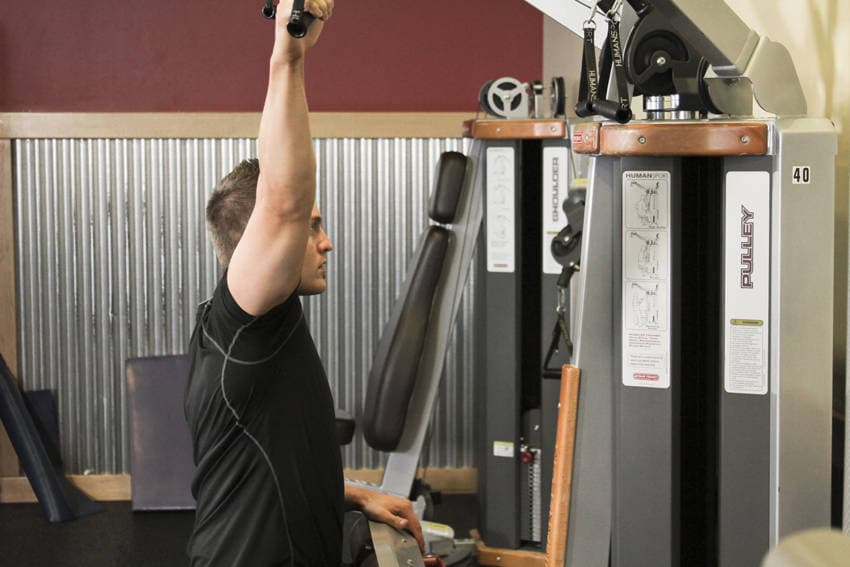 One Arm Lat Pulldown, position 1 of 2