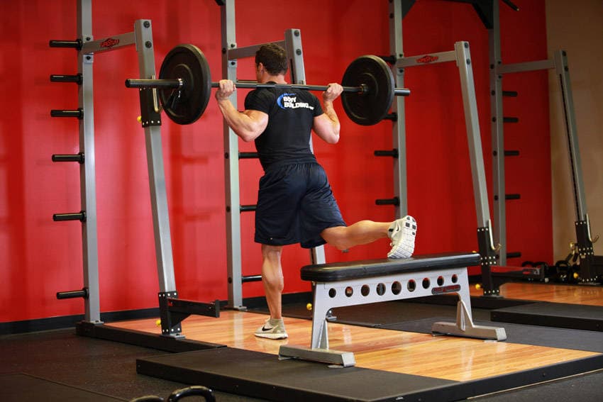 One Leg Barbell Squat, position 1 of 2