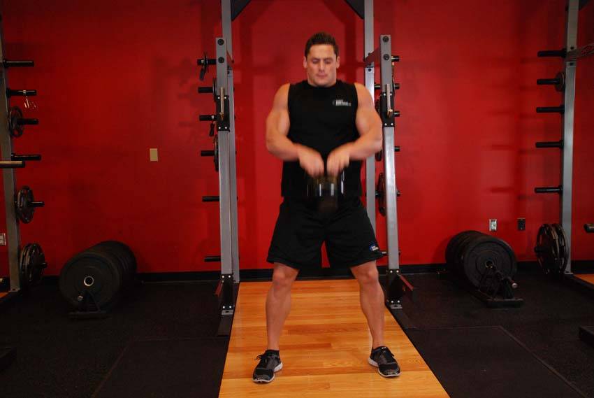 Open Palm Kettlebell Clean, position 2 of 2