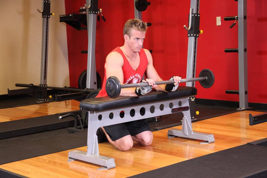Palms-Down Wrist Curl Over A Bench, position 2 of 2