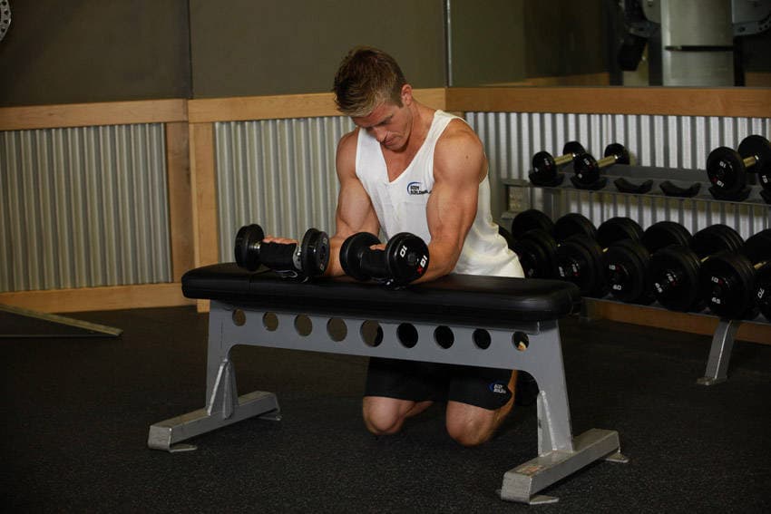 Palms-Up Dumbbell Wrist Curl Over A Bench, position 2 of 2
