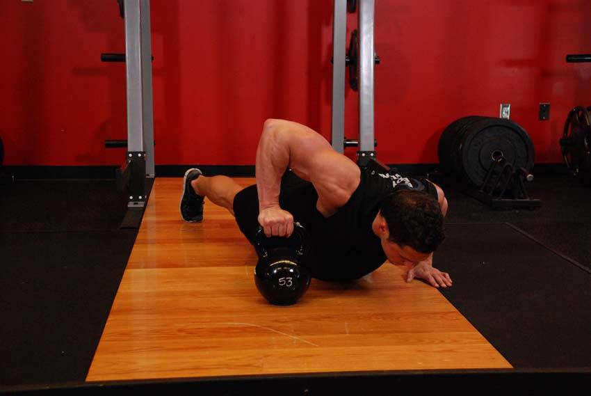 Plyo Kettlebell Pushups, position 2 of 2