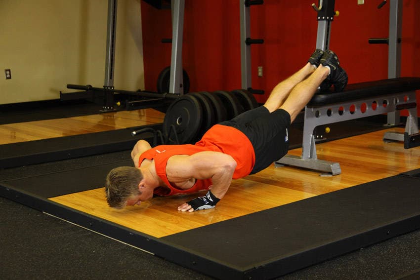 Push-Ups With Feet Elevated, position 2 of 2
