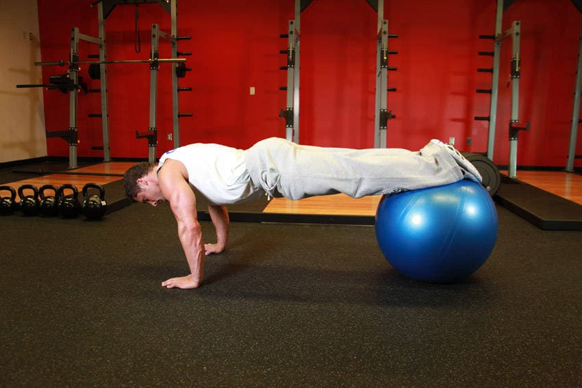 Push-Ups With Feet On An Exercise Ball, position 2 of 2