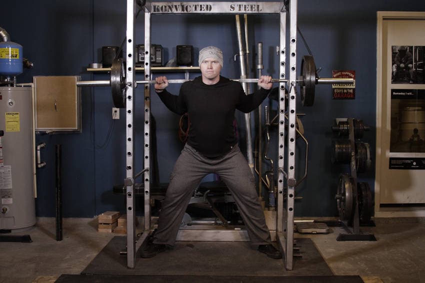 Reverse Band Power Squat, position 1 of 2