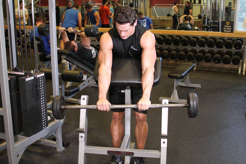 Reverse Barbell Preacher Curls, position 1 of 2