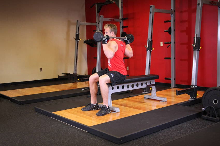 Seated Barbell Twist, position 1 of 2