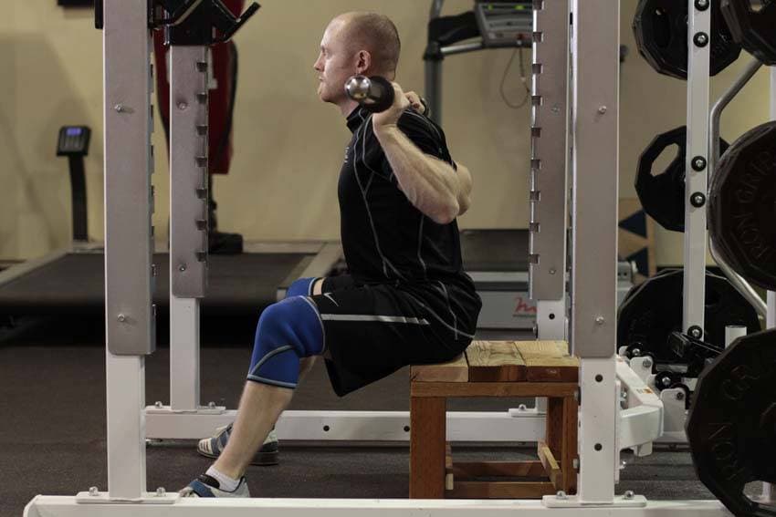 Seated Good Mornings, position 1 of 2