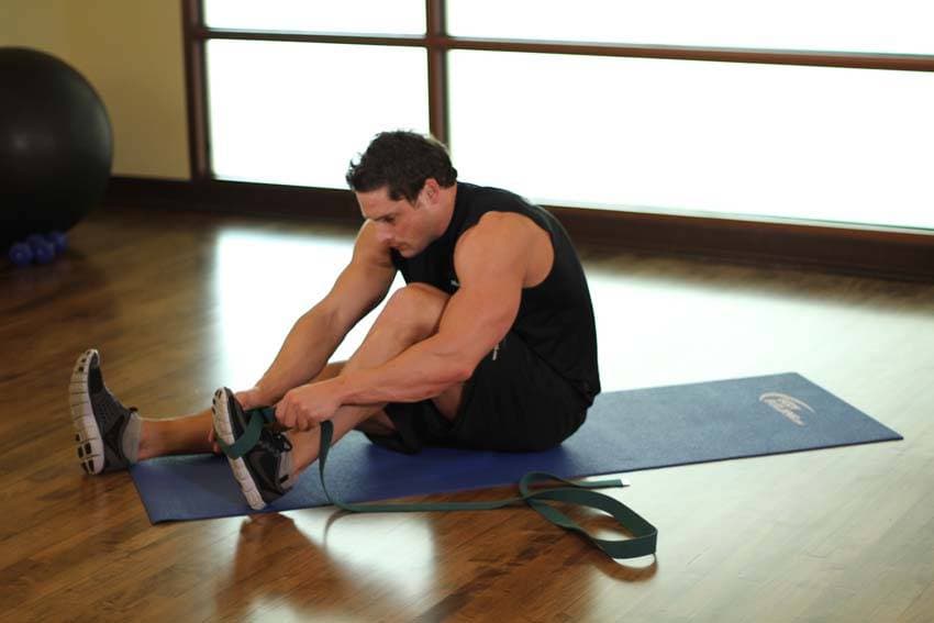 Seated Hamstring and Calf Stretch, position 1 of 2