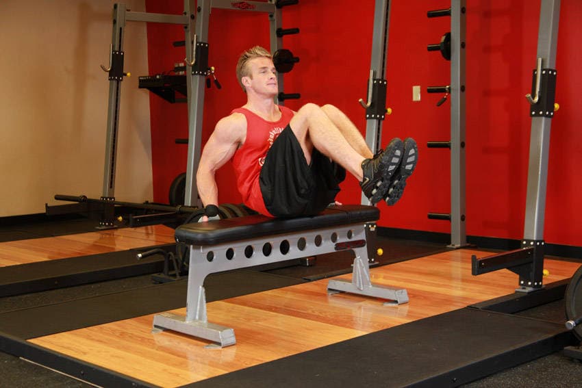 Seated Leg Tucks, position 1 of 2