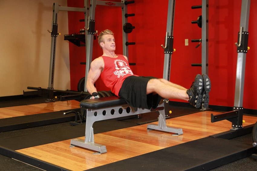 Seated Leg Tucks, position 2 of 2
