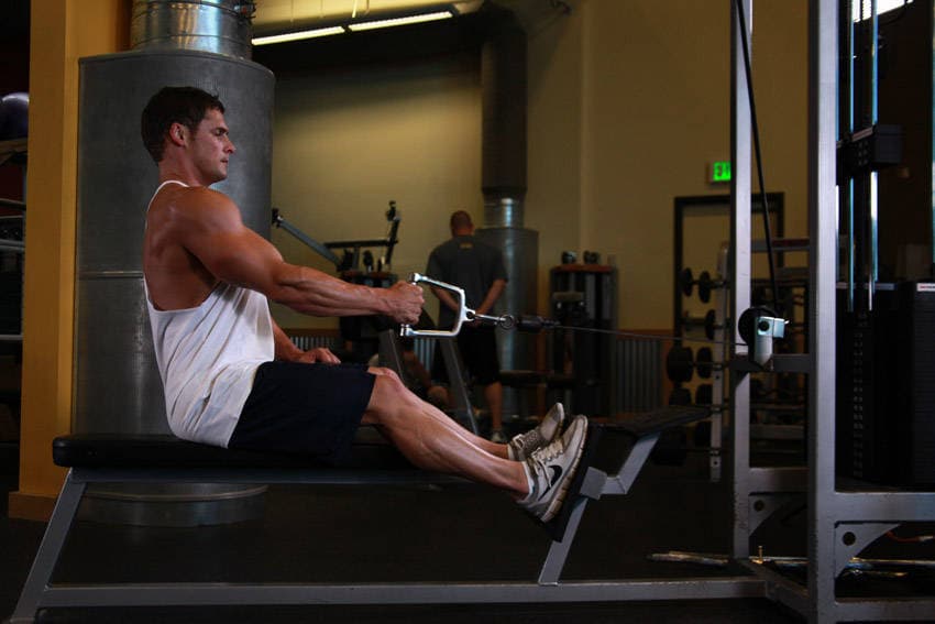 Seated One-arm Cable Pulley Rows, position 1 of 2