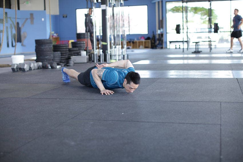 Single-Arm Push-Up, position 1 of 2