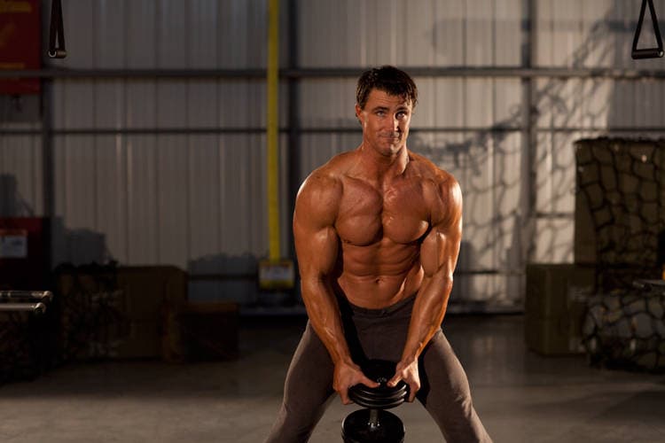 Single Dumbbell Raise, position 1 of 2