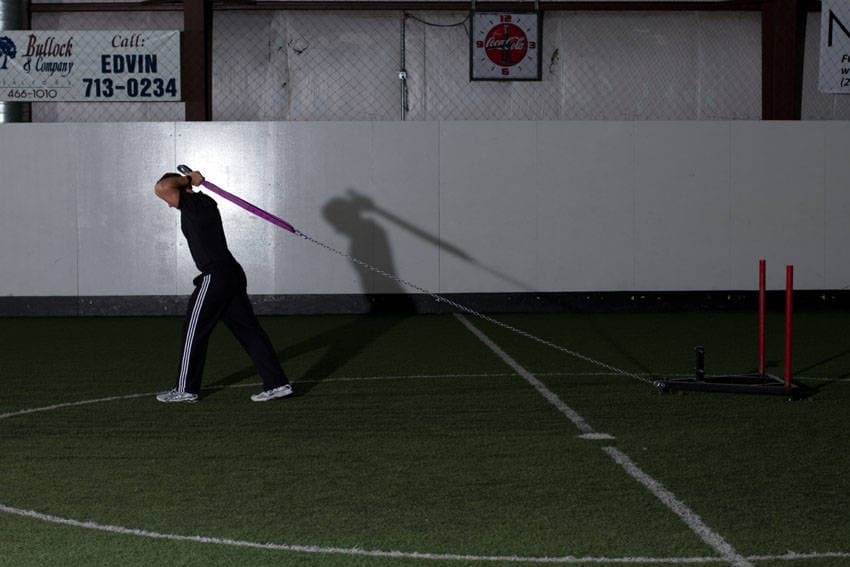 Sled Overhead Triceps Extension, position 1 of 2