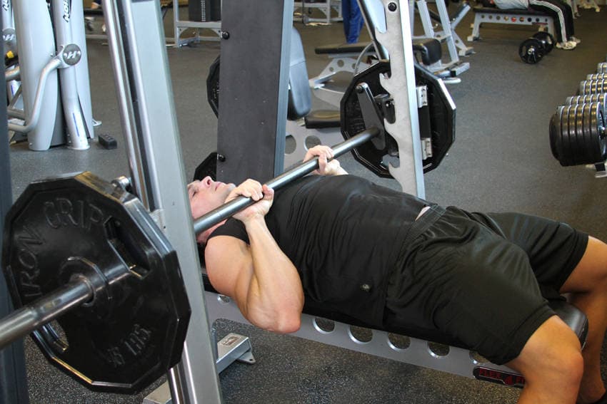 Smith Machine Close-Grip Bench Press, position 1 of 2