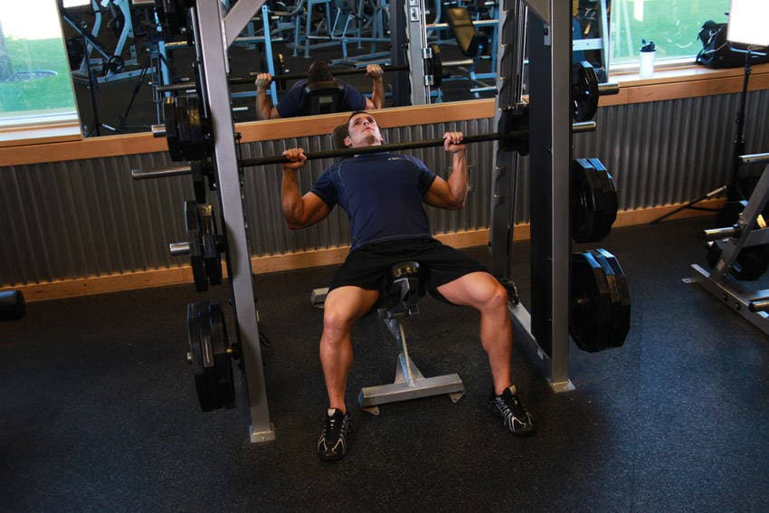 Smith Machine Incline Bench Press, position 1 of 2