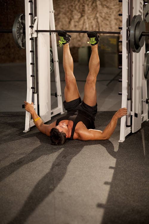 Smith Machine Leg Press, position 1 of 2
