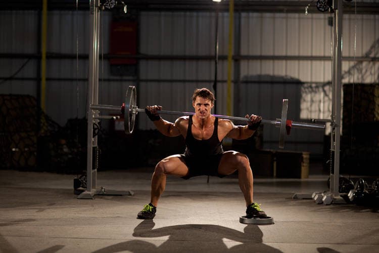 Squat with Plate Movers, position 2 of 2