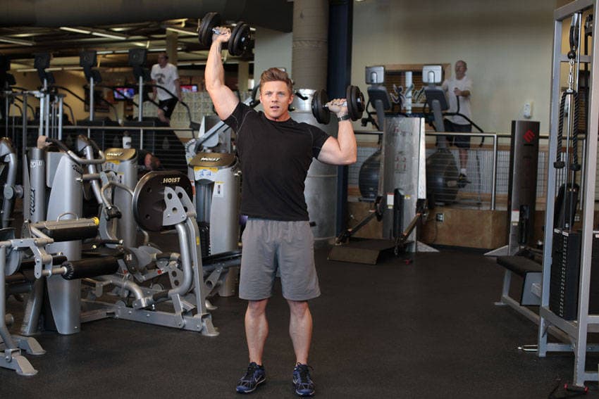 Standing Alternating Dumbbell Press, position 2 of 2