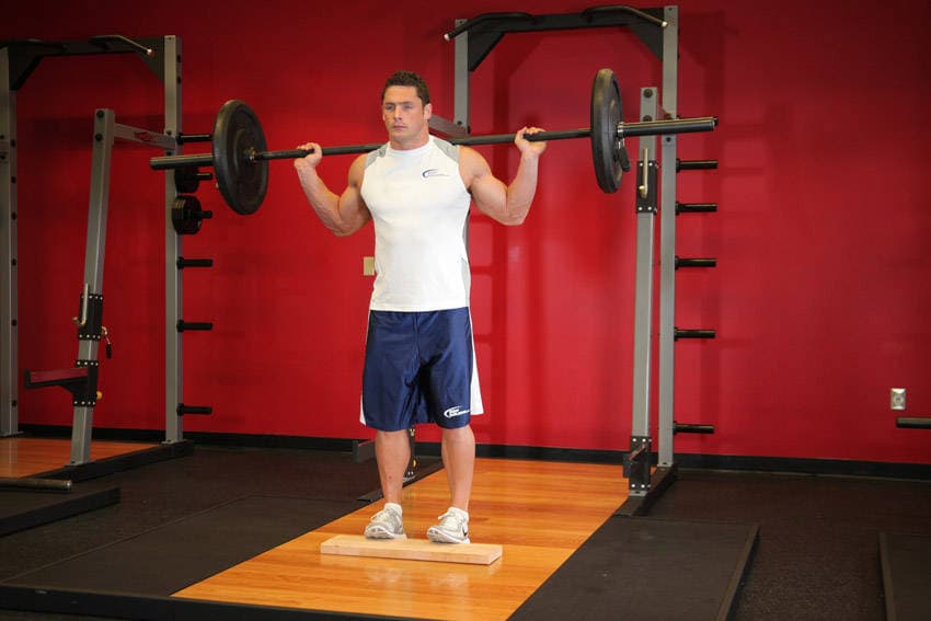 Standing Barbell Calf Raise, position 2 of 2