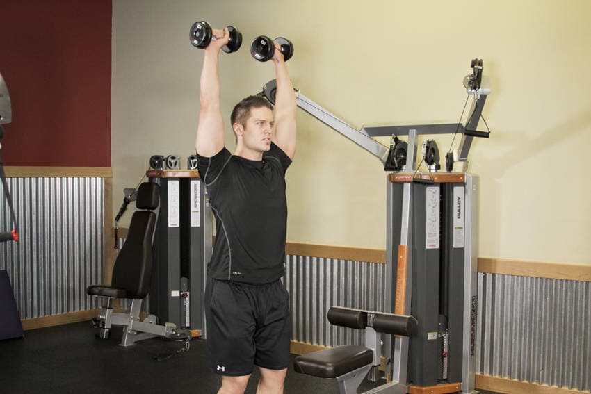 Standing Dumbbell Press, position 2 of 2