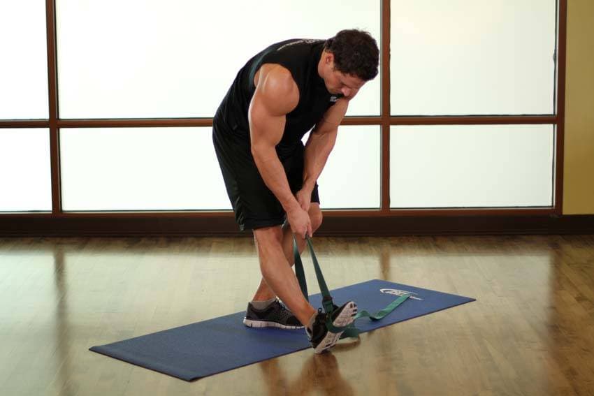 Standing Hamstring and Calf Stretch, position 1 of 2
