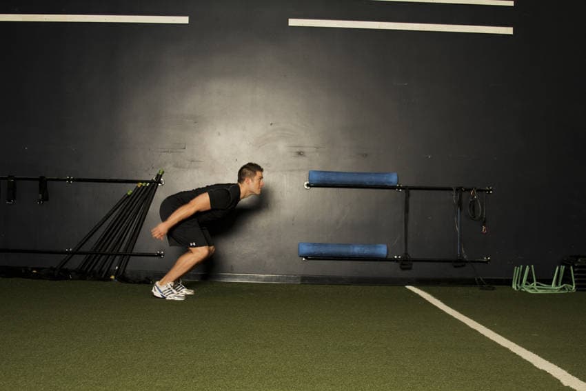 Standing Long Jump, position 1 of 2