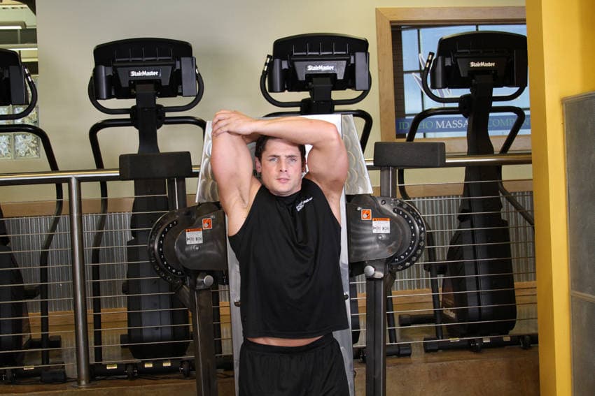 Standing Low-Pulley One-Arm Triceps Extension, position 1 of 2