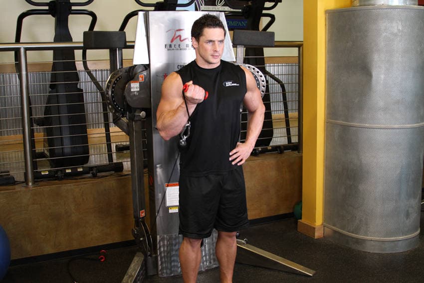 Standing One-Arm Cable Curl, position 2 of 2