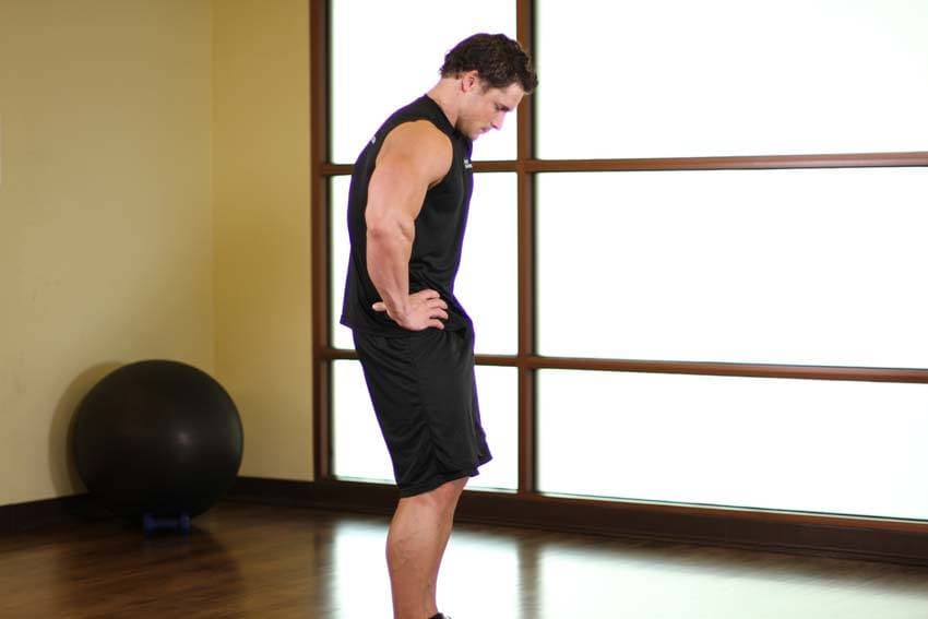 Standing Pelvic Tilt, position 2 of 2