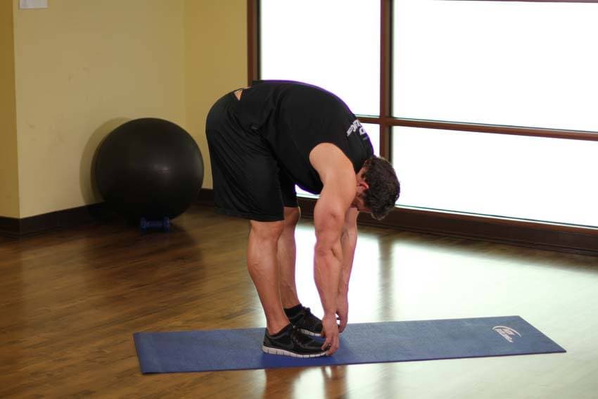 Standing Toe Touches, position 2 of 2