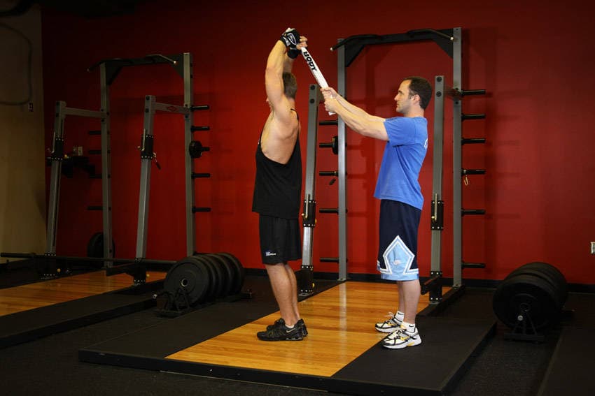 Standing Towel Triceps Extension, position 2 of 2