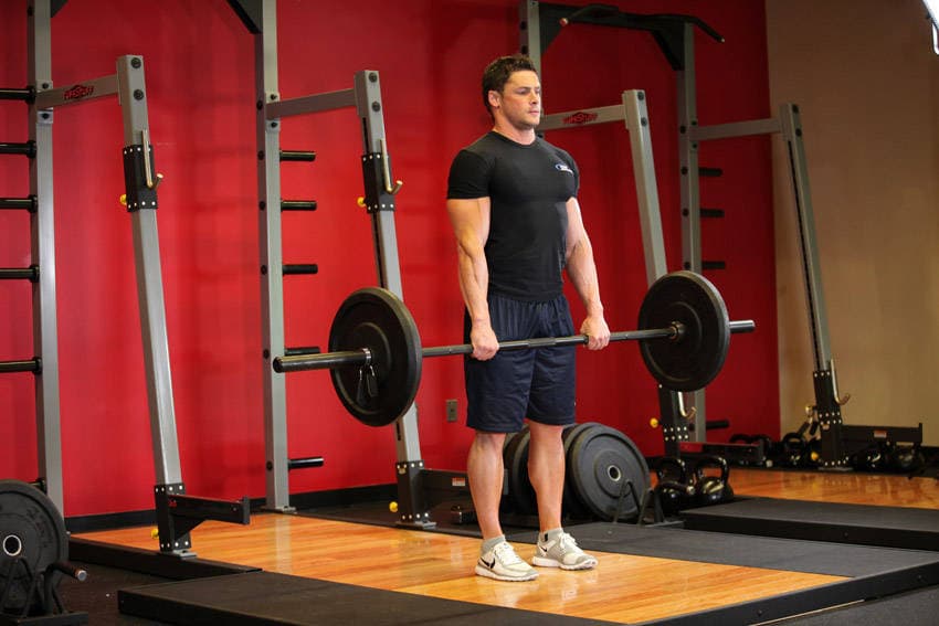 Stiff-Legged Barbell Deadlift, position 2 of 2