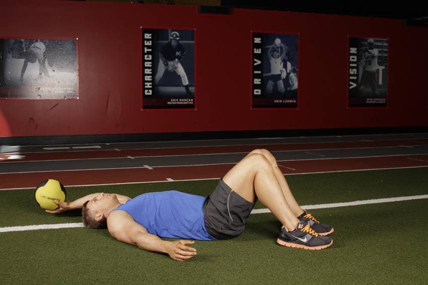 Supine One-Arm Overhead Throw, position 1 of 2