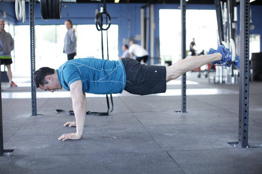 Suspended Reverse Crunch, position 1 of 2