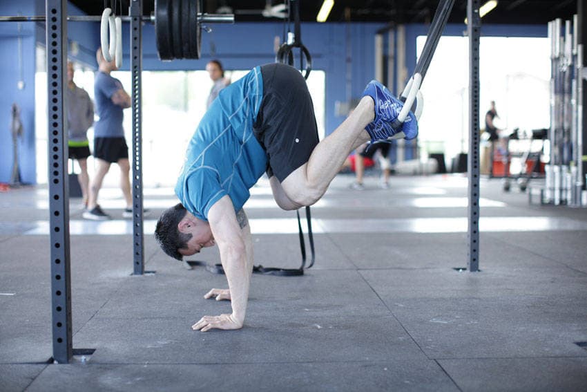 Suspended Reverse Crunch, position 2 of 2