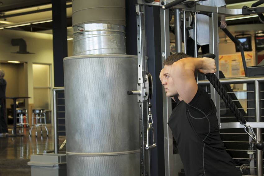 Triceps Overhead Extension with Rope, position 1 of 2