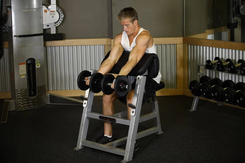 Two-Arm Dumbbell Preacher Curl, position 1 of 2