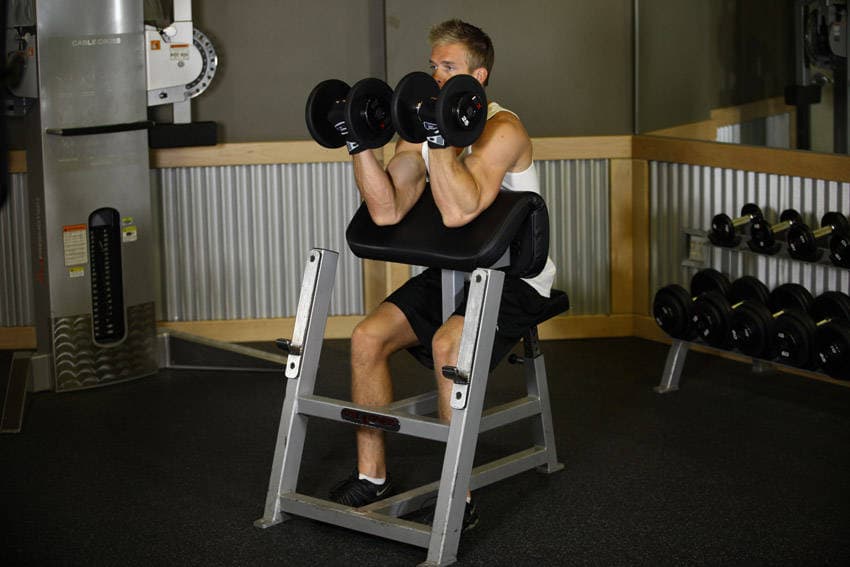 Two-Arm Dumbbell Preacher Curl, position 2 of 2