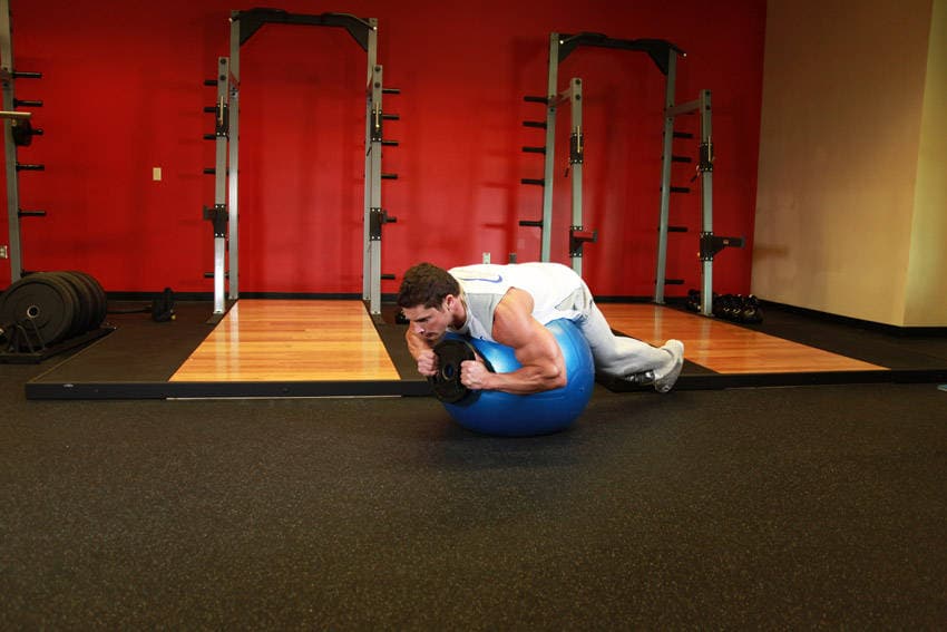 Weighted Ball Hyperextension, position 1 of 2
