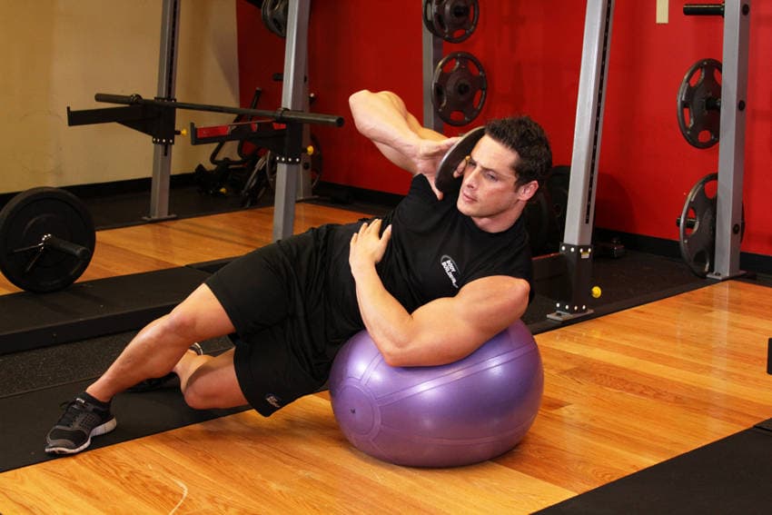 Weighted Ball Side Bend, position 2 of 2